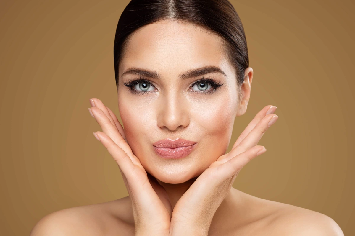 Woman highlighting enhanced lashes after Lash Enhancement in Wappingers Falls, NY